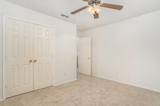 6204 Pennsylvania Ave, Arlington, TX 76017 - unfurnished bedroom with light carpet, a closet, and ceiling fan