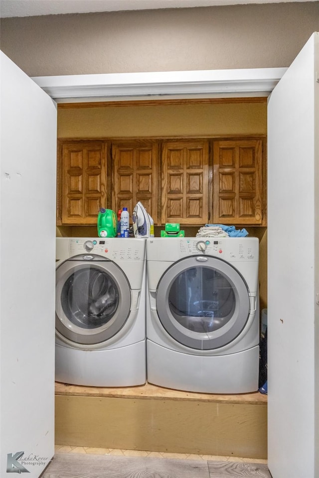 1626 Morrow Ln, Abilene, TX 79601 - laundry area featuring cabinet space and washer and dryer