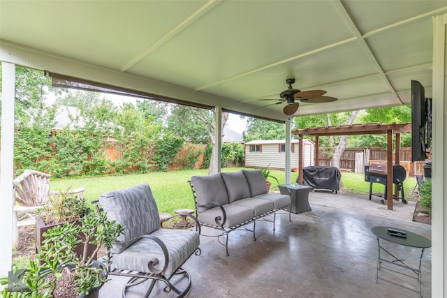 1626 Morrow Ln, Abilene, TX 79601 - view of patio / terrace with grilling area, an outdoor structure, a storage shed, outdoor lounge area, and ceiling fan
