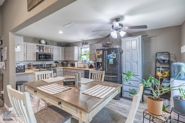 1626 Morrow Ln, Abilene, TX 79601 - dining area featuring a ceiling fan, light wood finished floors, and recessed lighting