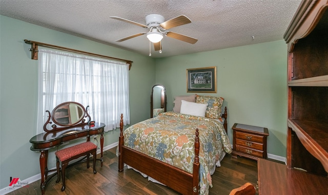9507 Chapparral Ln, Shreveport, LA 71118 - bedroom with baseboards, a textured ceiling, a ceiling fan, and wood finished floors