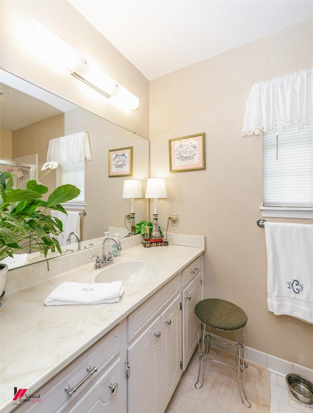 9507 Chapparral Ln, Shreveport, LA 71118 - bathroom featuring vanity, tile patterned flooring, and baseboards