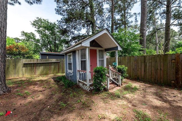 9507 Chapparral Ln, Shreveport, LA 71118 - view of shed with a fenced backyard