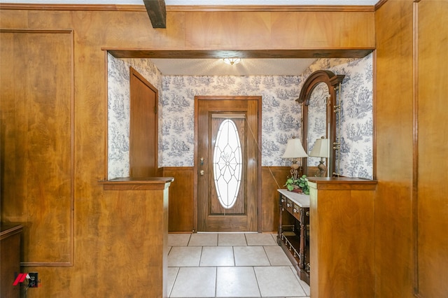 9507 Chapparral Ln, Shreveport, LA 71118 - entrance foyer with wainscoting, wallpapered walls, light tile patterned flooring, and wooden walls