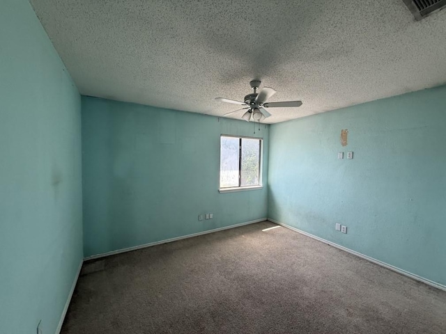 1420 Alta Mesa Ct, Mesquite, TX 75150 - carpeted spare room featuring ceiling fan, a textured ceiling, and baseboards