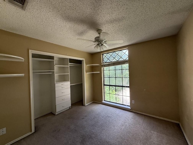 1420 Alta Mesa Ct, Mesquite, TX 75150 - unfurnished bedroom with a closet, a textured ceiling, carpet flooring, a ceiling fan, and baseboards