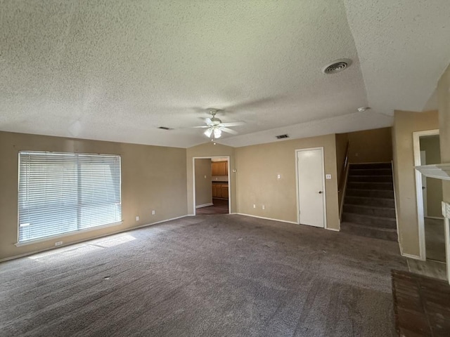 1420 Alta Mesa Ct, Mesquite, TX 75150 - carpeted spare room with ceiling fan, a textured ceiling, baseboards, and stairway
