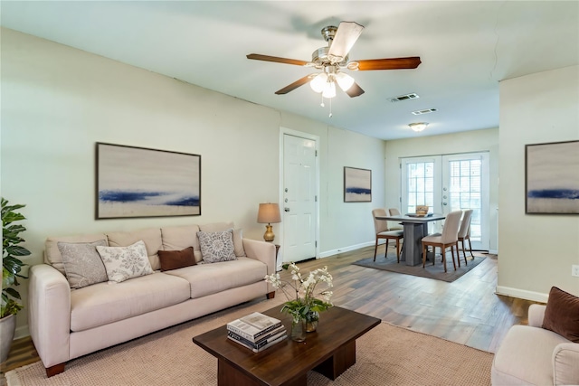 4312 Ridgedale Dr, Mesquite, TX 75150 - living area featuring wood finished floors, baseboards, and a ceiling fan