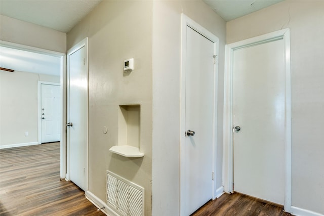 4312 Ridgedale Dr, Mesquite, TX 75150 - corridor with dark wood finished floors and baseboards