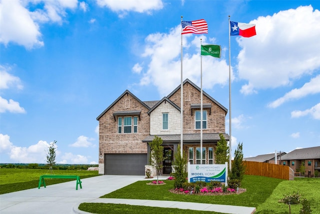 306 Ridge Dr, Justin, TX 76247 - view of front of property featuring an attached garage, brick siding, driveway, and stone siding
