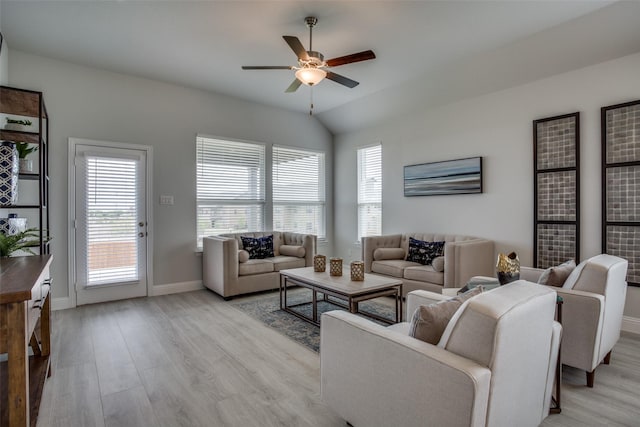 306 Ridge Dr, Justin, TX 76247 - living room with a ceiling fan, light wood-style flooring, baseboards, and vaulted ceiling