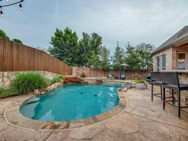 5924 Deerwood Ln, Frisco, TX 75036 - view of pool with a fenced backyard, a patio area, and a pool with connected hot tub