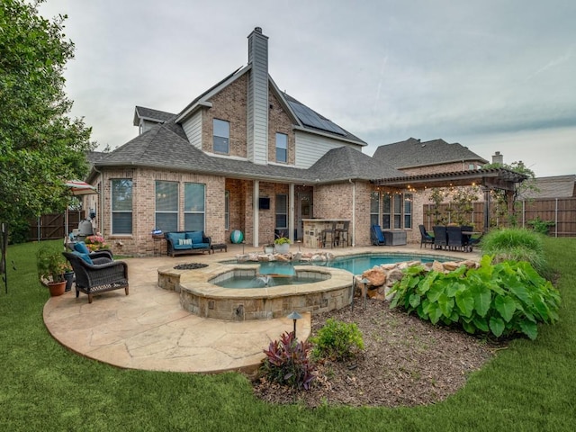 5924 Deerwood Ln, Frisco, TX 75036 - back of property featuring a pergola, brick siding, a chimney, and a patio