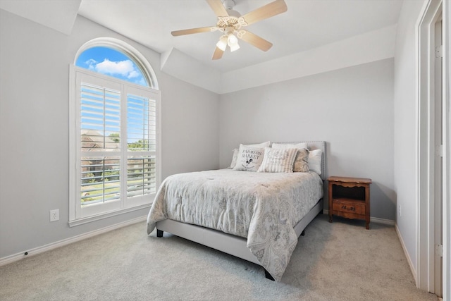 3921 Overlake Dr, Plano, TX 75023 - bedroom with light carpet, baseboards, and a ceiling fan