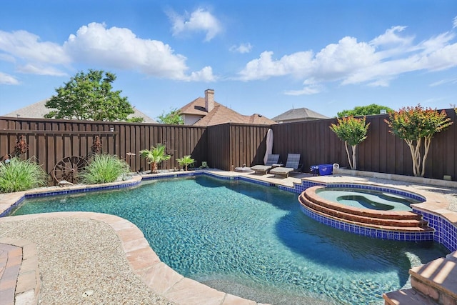 3921 Overlake Dr, Plano, TX 75023 - view of swimming pool with a fenced backyard and a pool with connected hot tub