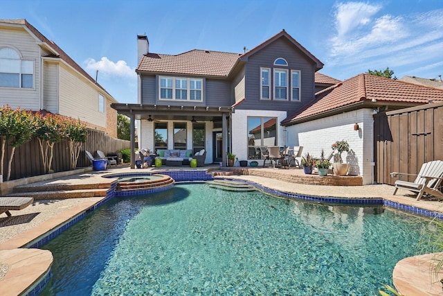 3921 Overlake Dr, Plano, TX 75023 - view of pool featuring a patio area, ceiling fan, a fenced backyard, a pool with connected hot tub, and an outdoor living space
