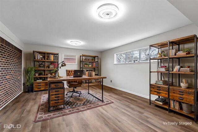 office with wood finished floors and baseboards