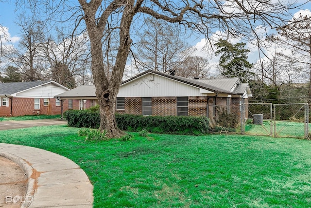 view of property exterior with brick siding and central AC unit