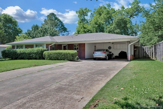 3315 Surrey Rd, Shreveport, LA 71105 - single story home featuring concrete driveway, a carport, and brick siding