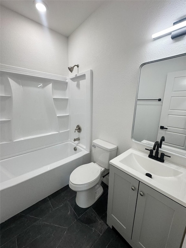 211 N 4th St, Grandview, TX 76050 - full bath featuring toilet, bathtub / shower combination, vanity, and a textured wall