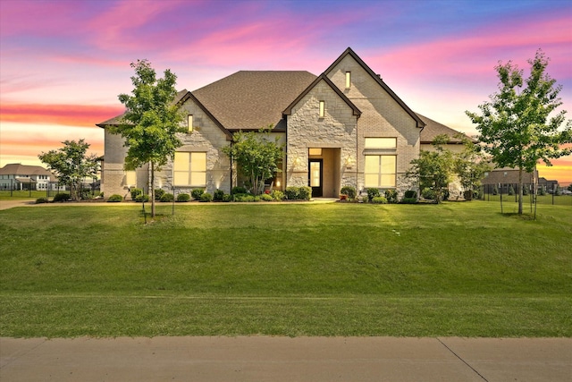 2101 Narrow Rd, Lucas, TX 75002 - french country inspired facade with stone siding, a yard, and a shingled roof