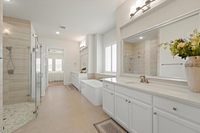 2101 Narrow Rd, Lucas, TX 75002 - bathroom featuring a stall shower, vanity, a freestanding bath, tile patterned flooring, and ensuite bath