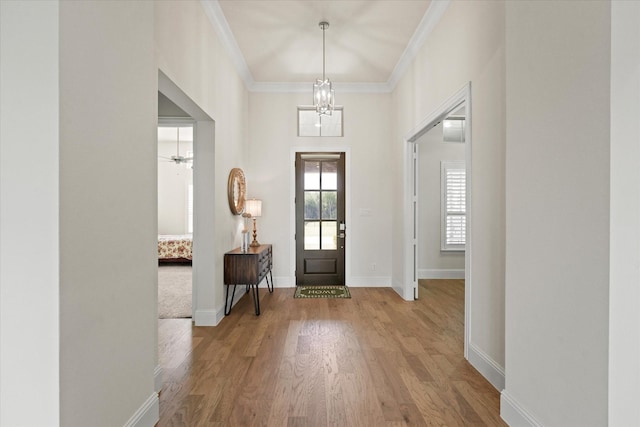 2101 Narrow Rd, Lucas, TX 75002 - entryway with a chandelier, wood finished floors, ornamental molding, and baseboards