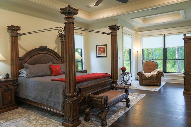 515 Cheryl Ct, Bullard, TX 75757 - bedroom featuring ornamental molding, hardwood / wood-style floors, and a tray ceiling
