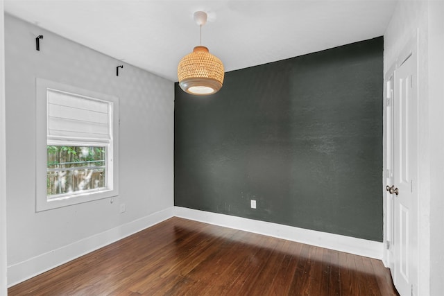 1217 Hawthorne Ave, Fort Worth, TX 76110 - empty room with hardwood / wood-style floors and baseboards