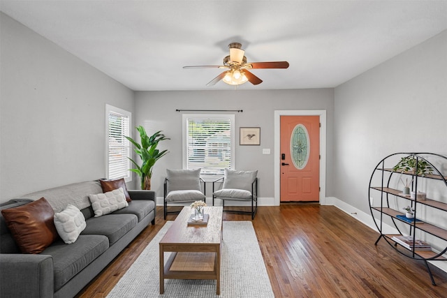 1217 Hawthorne Ave, Fort Worth, TX 76110 - living room with a ceiling fan, dark wood-style flooring, and baseboards