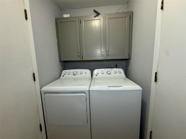 1400 Royal Ln, Cisco, TX 76437 - laundry room with cabinet space and washing machine and clothes dryer