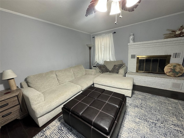 1400 Royal Ln, Cisco, TX 76437 - living area with ornamental molding, ceiling fan, and a brick fireplace