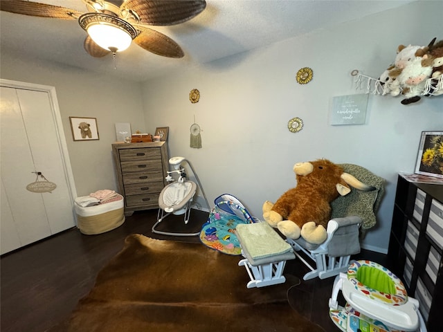 1400 Royal Ln, Cisco, TX 76437 - bedroom with wood finished floors and a ceiling fan