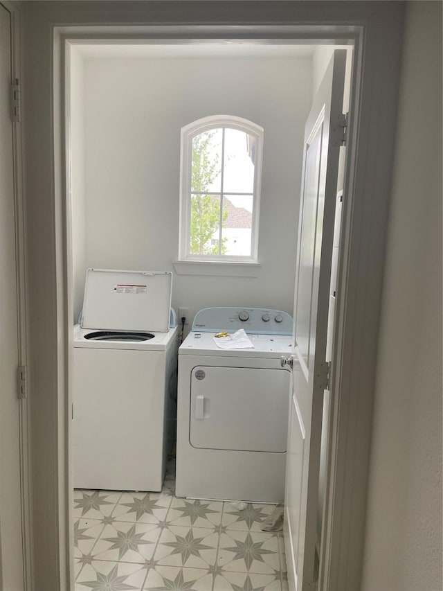 3913 Crystal Cv, Sherman, TX 75090 - washroom with washer and clothes dryer and light flooring