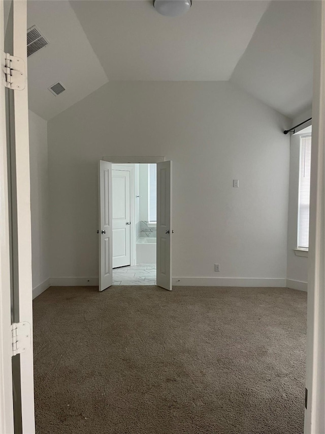 3913 Crystal Cv, Sherman, TX 75090 - carpeted empty room featuring vaulted ceiling and baseboards