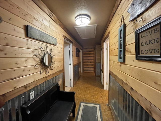 190 Fcr 192, Streetman, TX 75859 - hallway featuring wood walls and attic access