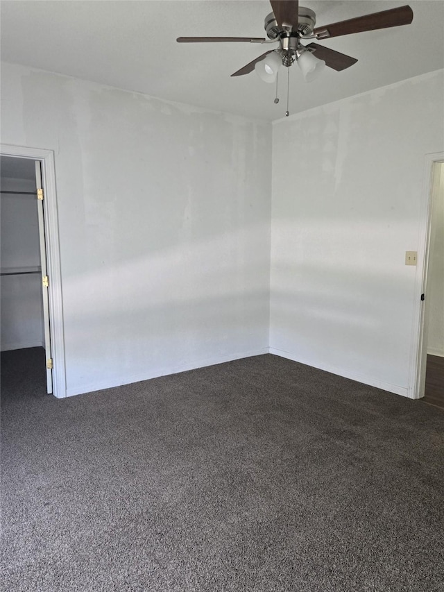 811 Vincent St, Brownwood, TX 76801 - empty room featuring ceiling fan and dark carpet