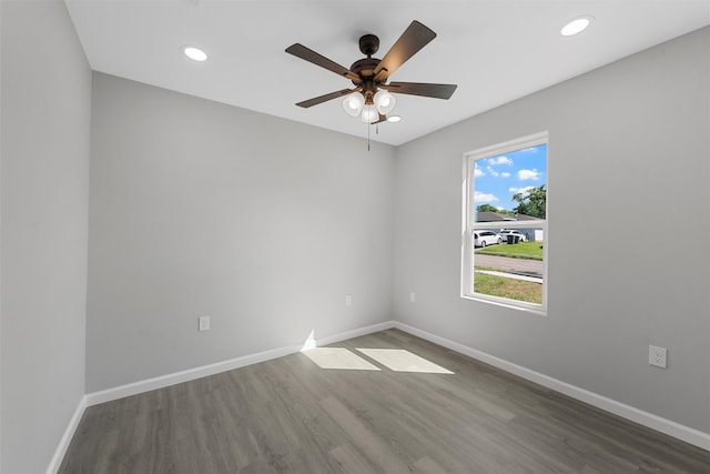 2208 Jane St, Waco, TX 76711 - spare room with wood finished floors, baseboards, a ceiling fan, and recessed lighting