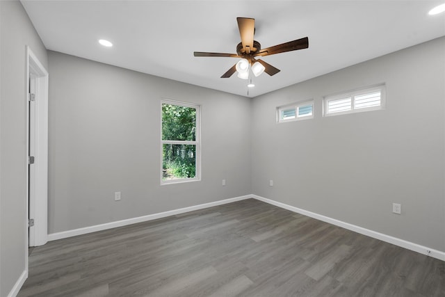2208 Jane St, Waco, TX 76711 - unfurnished room featuring ceiling fan, dark wood finished floors, recessed lighting, and baseboards
