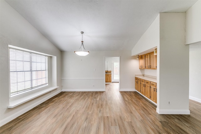 9306 Grant Dr, Rowlett, TX 75088 - unfurnished room featuring wood finished floors, baseboards, and a ceiling fan