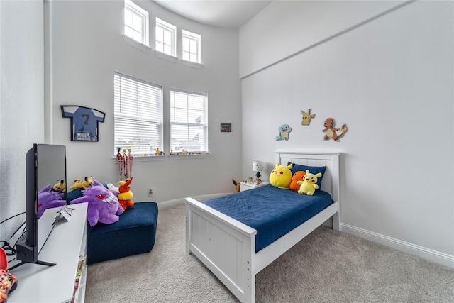 4506 Sky Harbor Dr, Rockwall, TX 75087 - bedroom with carpet, baseboards, and a high ceiling