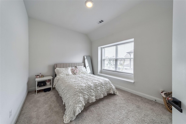 4506 Sky Harbor Dr, Rockwall, TX 75087 - carpeted bedroom with lofted ceiling and baseboards