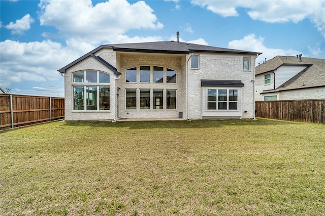 4506 Sky Harbor Dr, Rockwall, TX 75087 - rear view of property with brick siding