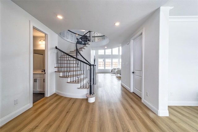 4506 Sky Harbor Dr, Rockwall, TX 75087 - entryway with light wood-style flooring, stairway, baseboards, and recessed lighting
