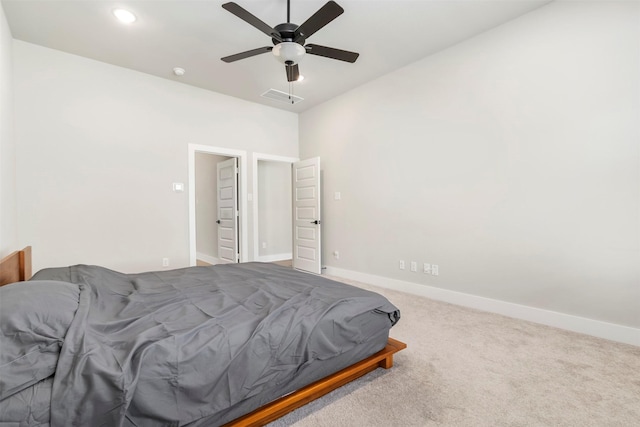 carpeted bedroom with baseboards, ceiling fan, and recessed lighting