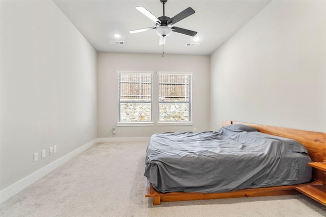 carpeted bedroom with baseboards, recessed lighting, and a ceiling fan