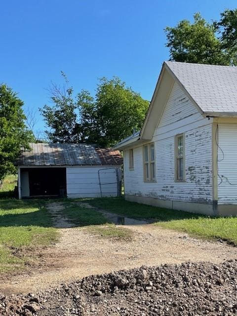 623 E Walnut St, Hillsboro, TX 76645 - view of property exterior with an outdoor structure