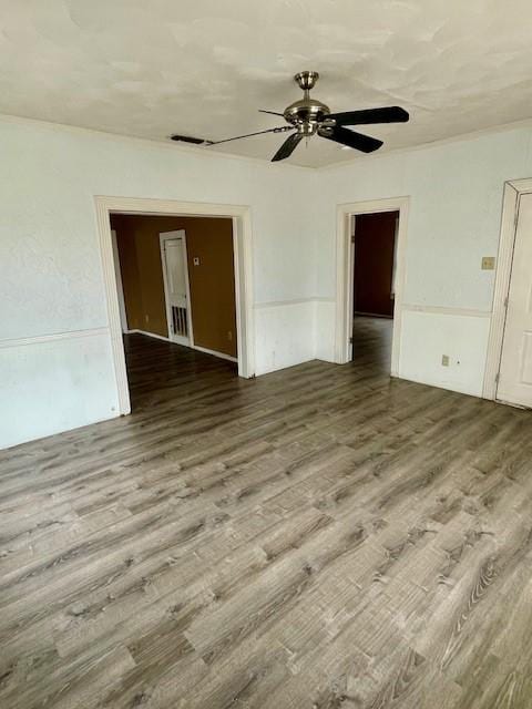 623 E Walnut St, Hillsboro, TX 76645 - spare room with wood finished floors and ceiling fan