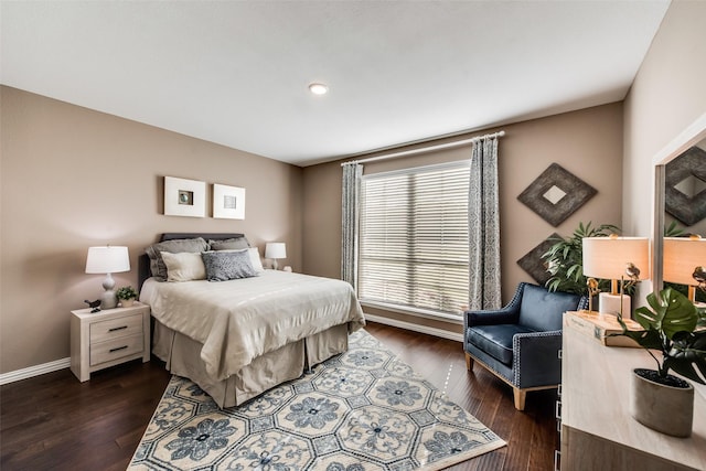 bedroom featuring baseboards, dark wood-style flooring, and recessed lighting