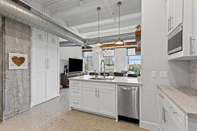 221 W Lancaster Ave Unit 4012, Fort Worth, TX 76102 - kitchen featuring a sink, appliances with stainless steel finishes, a peninsula, and white cabinetry